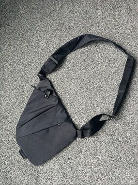Wander Black Triangular Crossbody Sling Bag